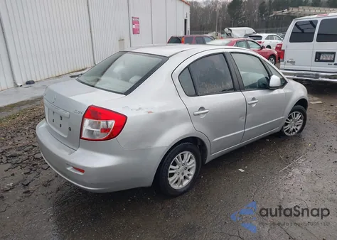 2012 Suzuki Sx4 Le/Le Popular z USA, uszkodzony, nr VIN JS2YC5A38C6303857
